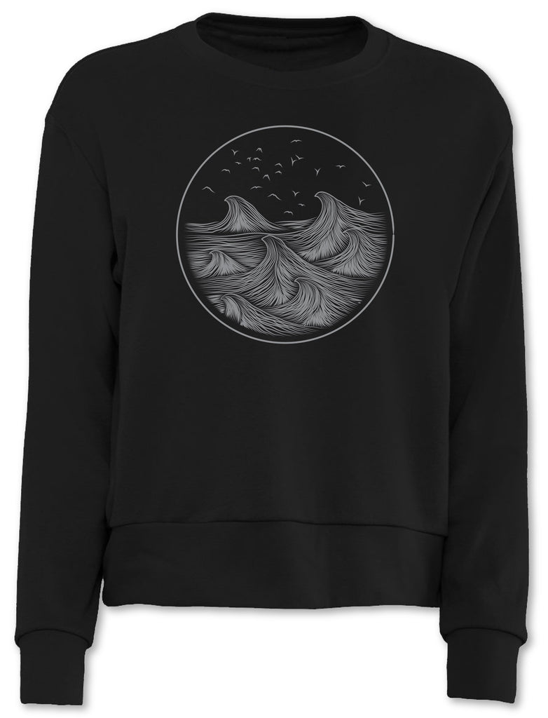 Cozy and warm women’s sweater with hand drawn ocean waves